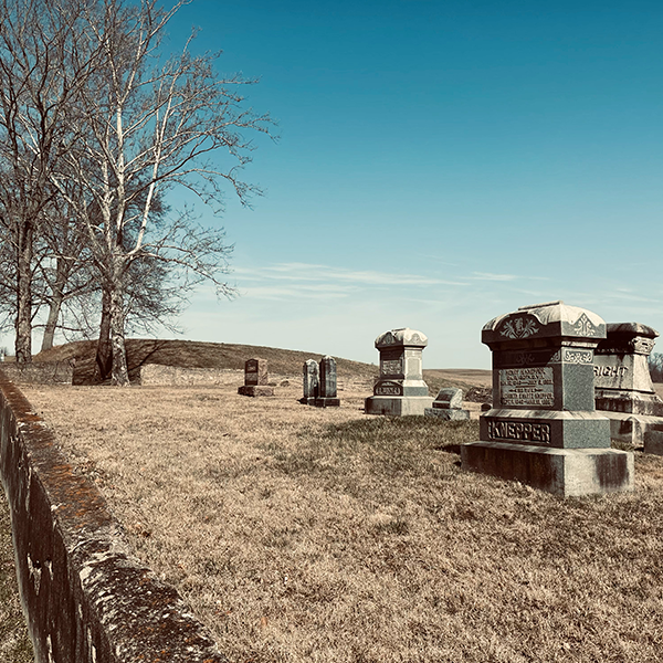 Bright Cemetery Photo – The Far-Land Legacy